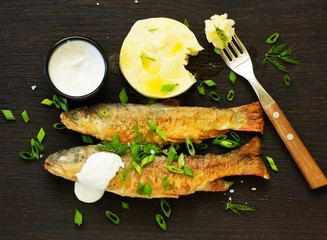 Fried river trout. View from above.