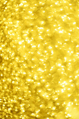 Sparkle glittering background. Square crop. Holiday abstract texture. Christmas card with copy space, gold bokeh, defocused lights.