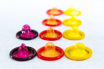 Concept for healthcare - Close up shot of various Colorful condoms