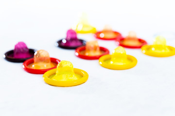 Concept for healthcare - Close up shot of various Colorful condoms