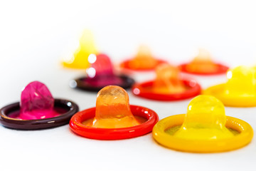 Concept for healthcare - Close up shot of various Colorful condoms