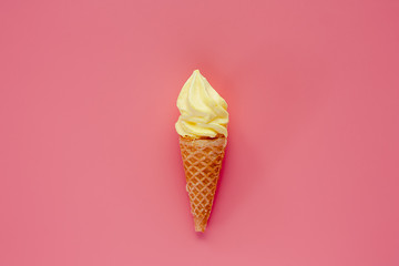Ice cream cone on pink background for sweet and refreshing dessert concept