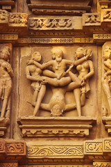 Sex Poses - Close up of Kamasutra scenes on the wall of Hindu temple in western group of temple Khajuraho, India