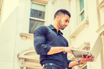 Way to Success. Young East Indian American Businessman with beard working in New York, wearing...
