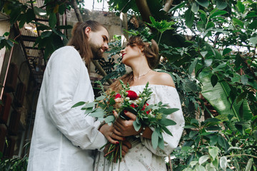 Beautiful couple in botanical garden