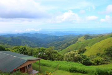 A beautiful long-distance view over the green lush and mountainus landscape - Costa Rica