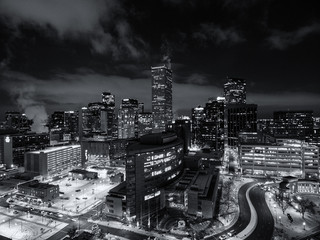 Aerial drone black and white cityscape of the capital city of Denver Colorado at night