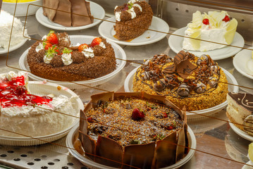 Display of confectionery with cakes and sweet pies