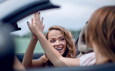 close up.good friends giving each other high five.