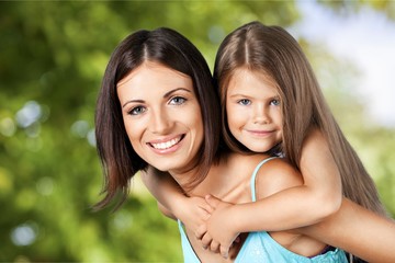 Happy Mother and daughter hugging