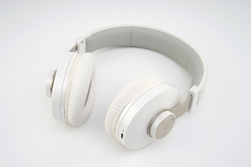 White wireless headphones isolated on white background