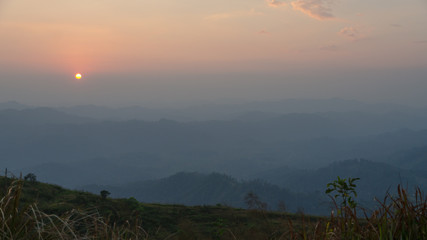Mountain field during sunset. Beautiful natural landscape, Kanchanaburi, Thailand, 16:9