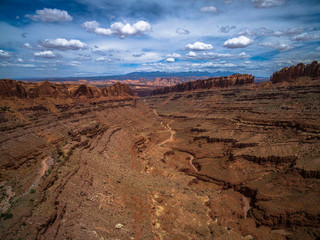 Fototapeta na wymiar Drone/Aerial Panorama of the Vista Overlooking the Beautiful Utah Desert with the Majestic LaSalle Mountains in the Distance. From Long Canyon Road, Moab
