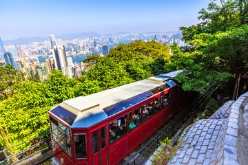 Selbstklebende Fototapete Hong Kong Die Peak Tram ist eine Standseilbahn in Hongkong, die zum höchsten Punkt der Insel führt: dem Victoria Peak.