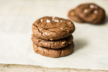 dark chocolate homemade cookies tower with pinch of salt