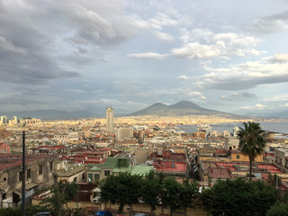 Fototapeta na wymiar Napoli (Naples) with Mount Vesuvius in the background on a Cloudy day, Italy, Campania
