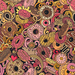 Donuts hand drawn doodles seamless pattern. Sprinkled doughnuts background.
