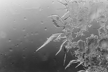 Snow patterns on glass as an abstract background