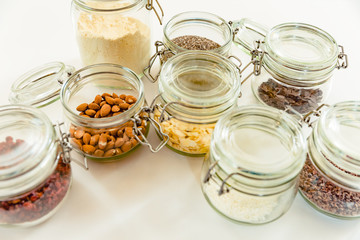 An overhead view of ingredients for making oatmeal in the glass jar