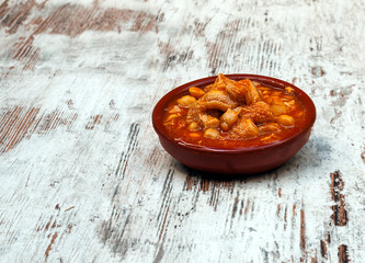 Meat surrounded by rustic background