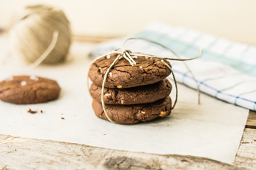 Dark and white chocolate chip homemade cookies tower tied with a string