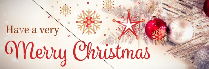 Merry Christmas message on wood background