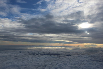 Obraz na płótnie Canvas Beautiful colourful cloudscape captured from plane