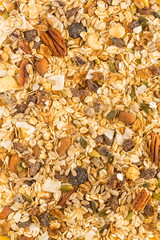 Close up of breakfast museli with nuts,raisins and oats