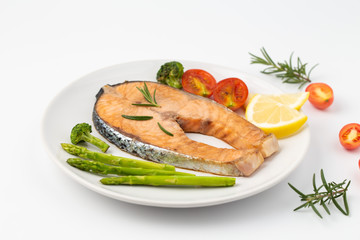 Salmon Grilled on a white plate isolated on white background.