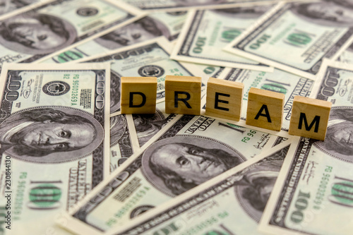 Word Dream On One Hundred Dollar Bills Background Concept Money Buys Dreams Word Dream On One Hundred Dollar Bills Background Concept Money Buys Dreams