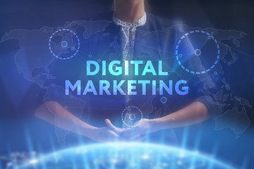 The concept of business, technology, the Internet and the network. A young entrepreneur working on a virtual screen of the future and sees the inscription: Digital Marketing