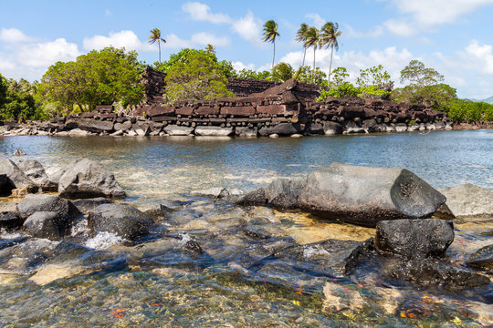Nan Madol prehistoric ruined stone city. Ancient walls built on coral artificial islands linked by canals in a lagoon of Pohnpei, Micronesia, Oceania