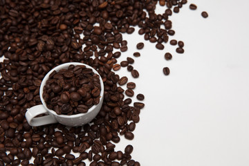 Coffee beans and cup