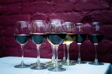 Many glasses of wine in a luxurious, stylish atmosphere. Social welcome, new year, wedding, party