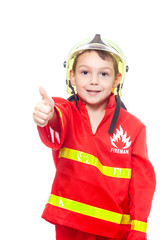 Naklejka premium Junge als Feuerwehrmann mit Daumen hoch