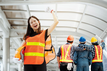 Asian female chiefs are delighted to have Team Construction asian workers are both engineers and...