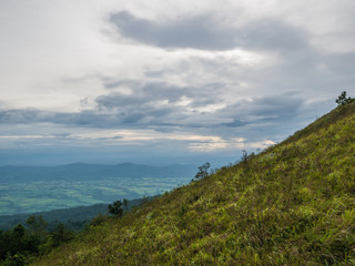 Fototapeta premium Khao Luang mountain With beautiful Blue Cloud sky in Ramkhamhaeng National Park,Sukhothai province Thailand
