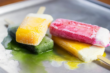 Fruit sorbet on gray background.