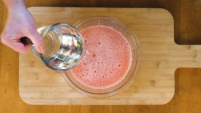 Close up, preparing jello in bowl
