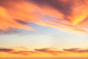 Sky in the pink and blue colors. effect of light pastel colored of sunset clouds
cloud on the sunset sky background with a pastel color
