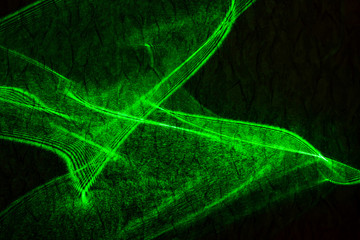 The projection of the laser through the glass on a flat surface