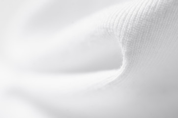 White warm fabric texture material sweater on blur background