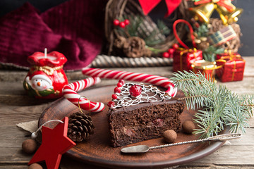 Slice of sweet chocolate cake for Christmas Eve.