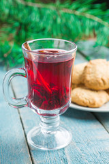 Christmas Mulled Wine with cookies on wooden background