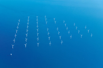 wind farm is a group of wind turbines - 230859127