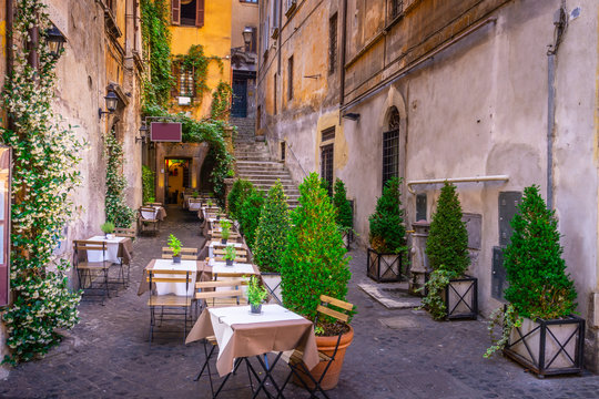 Cozy street in downtown, Rome, Europe. Touristic attraction of Rome.