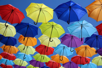 Fototapeta na wymiar Colorful umbrellas background. Street decoration.