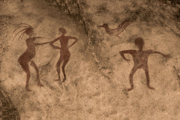 image of ancient people on the wall of the cave. history of antiquities, archeology.