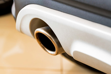 Exhaust pipe of a modern white car