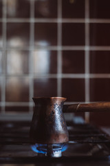  Cooking coffee on a gas stove.